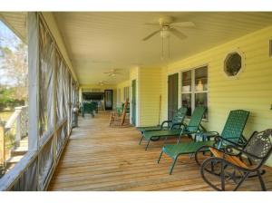 Fabulous and huge screened in back porch. Wonderful for enjoying